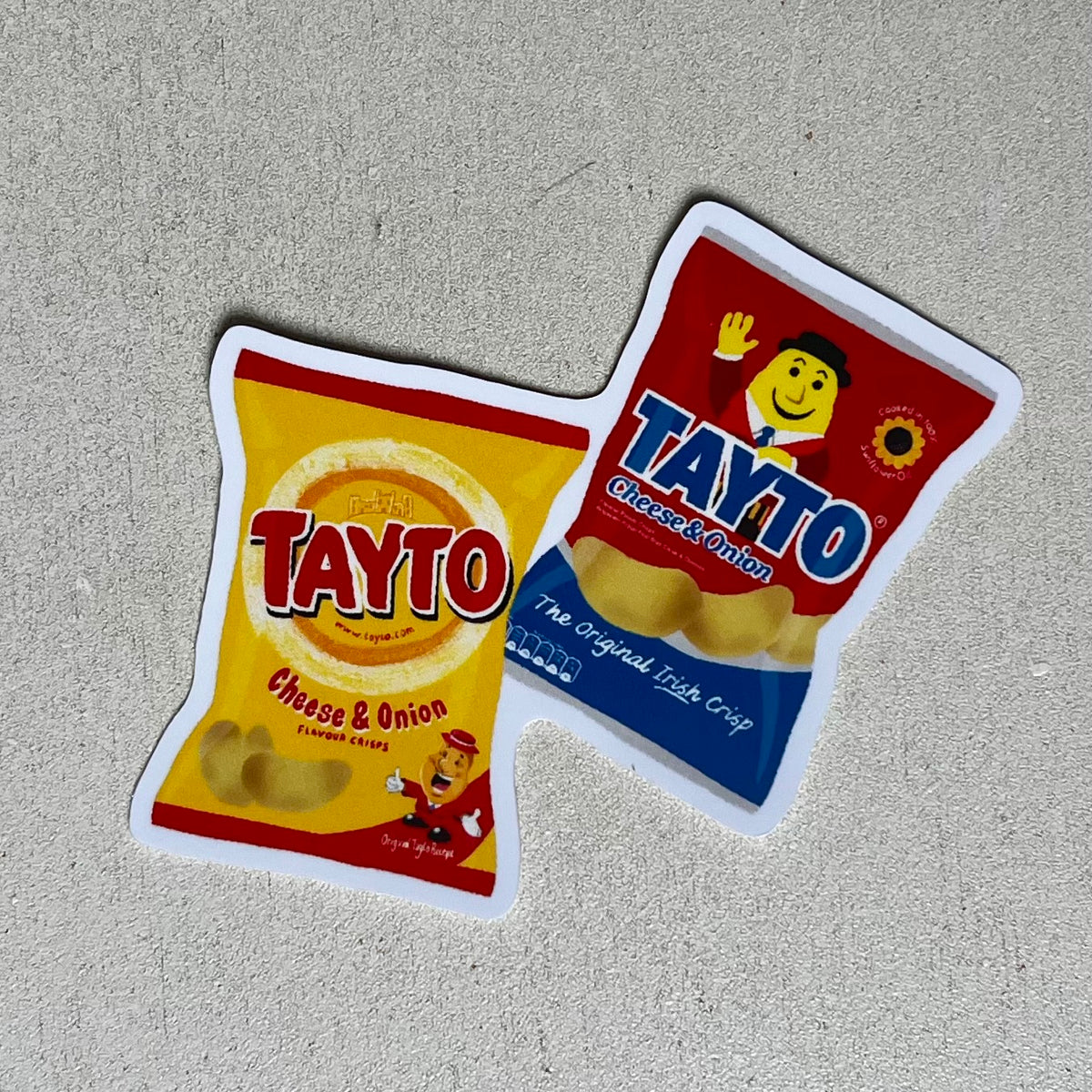 A Tale of Two Taytos Sticker
